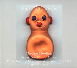 Chance Meeting On A Dissecting Table Of A Sewing Machine And An Umbrella